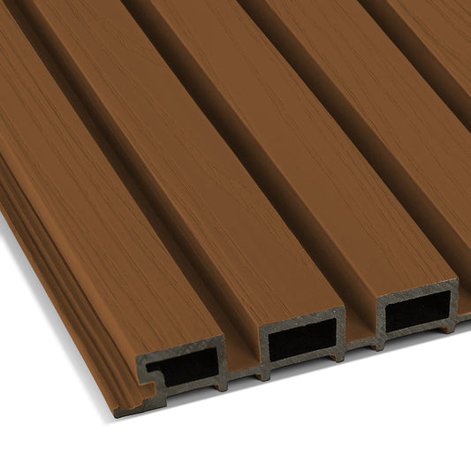 Close-up of Landmark Decor's Honey Chestnut Exterior WPC Panel featuring a brown wood texture, parallel hollow sections, and grooves—ideal for weather-resistant exterior panels or stylish outdoor wall decor.