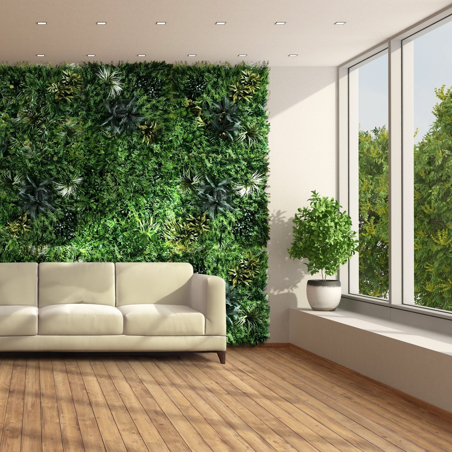 A modern living room featuring Landmark Decor's Tropical Oasis Grass Wall, a beige sofa, potted plant, large windows, and wood flooring.