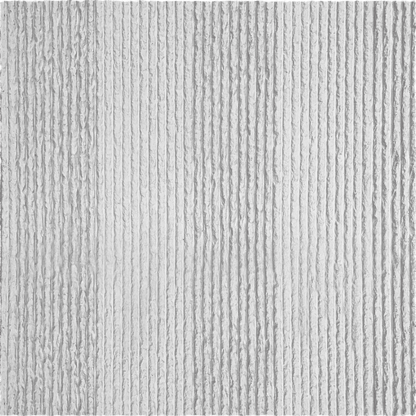 Close-up of Oman Linear Stone Sheet - White by Landmark Decor, showing a white, textured surface with vertical ridges and grooves, resembling flexible corrugated material.