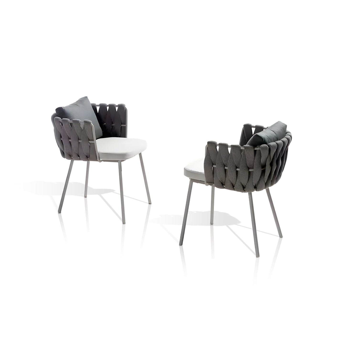 Landmark Decors Coastal Woven Collection offers two modern chairs with black woven backrests and armrests, ideal for alfresco dining. Each weather-resistant chair includes a white cushion seat and a gray pillow, set against a plain white backdrop.