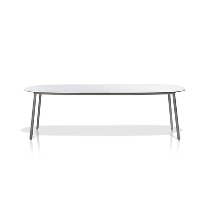 The Coastal Woven Collection table by Landmark Decor features a thin, flat rectangular surface with rounded edges and four angled legs, perfect for alfresco dining. Its weather-resistant design suits outdoor settings while its minimalist aesthetic exudes simplicity and elegance against a plain white backdrop.