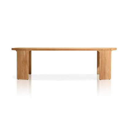 The Pacific Shoreline Collection by Landmark Decor offers a wooden bench with a minimalist design ideal for alfresco dining. It boasts a smooth light-brown finish, solid rectangular legs, and weather-resistant materials, preserving its modern look against a plain white background.