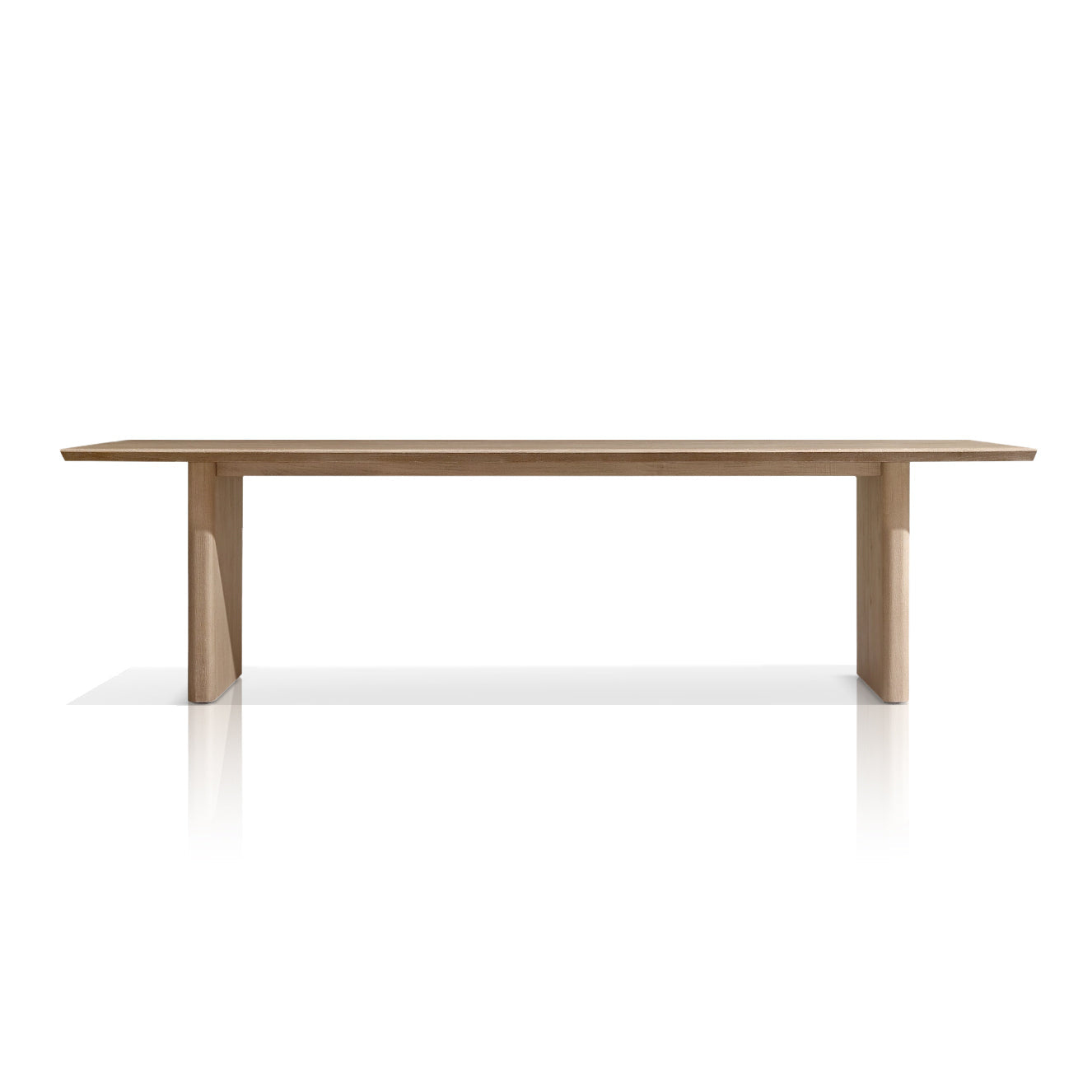 The Summer Solstice Collection by Landmark Decor features a minimalist wooden table with a rectangular top and sturdy legs, ideal for alfresco dining. Set against a white background, its clean lines and natural wood finish highlight elegance and functionality with weather-resistant materials.
