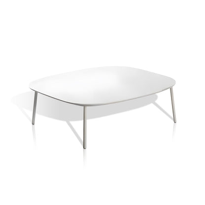 The Elysian Breeze Collection by Landmark Decor showcases a modern, minimalist white rectangular table with rounded edges and slender metal legs. It stands gracefully against a plain white background, enhanced by all-weather frames that promise lasting elegance outdoors.