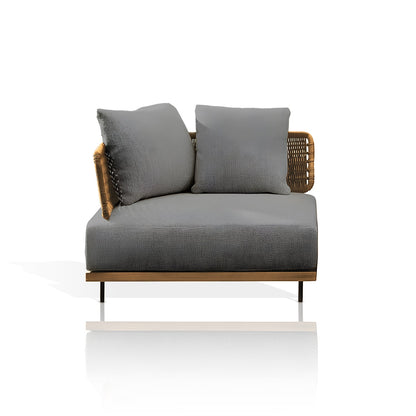 The Oceanview Oasis Collection by Landmark Decor is a modern single-seat loveseat with all-weather frames and dark gray weather-resistant cushions. It features intricate rattan detailing on the back and sides, supported by thin black metal legs, ideal for indoor ambiance or outdoor relaxation.