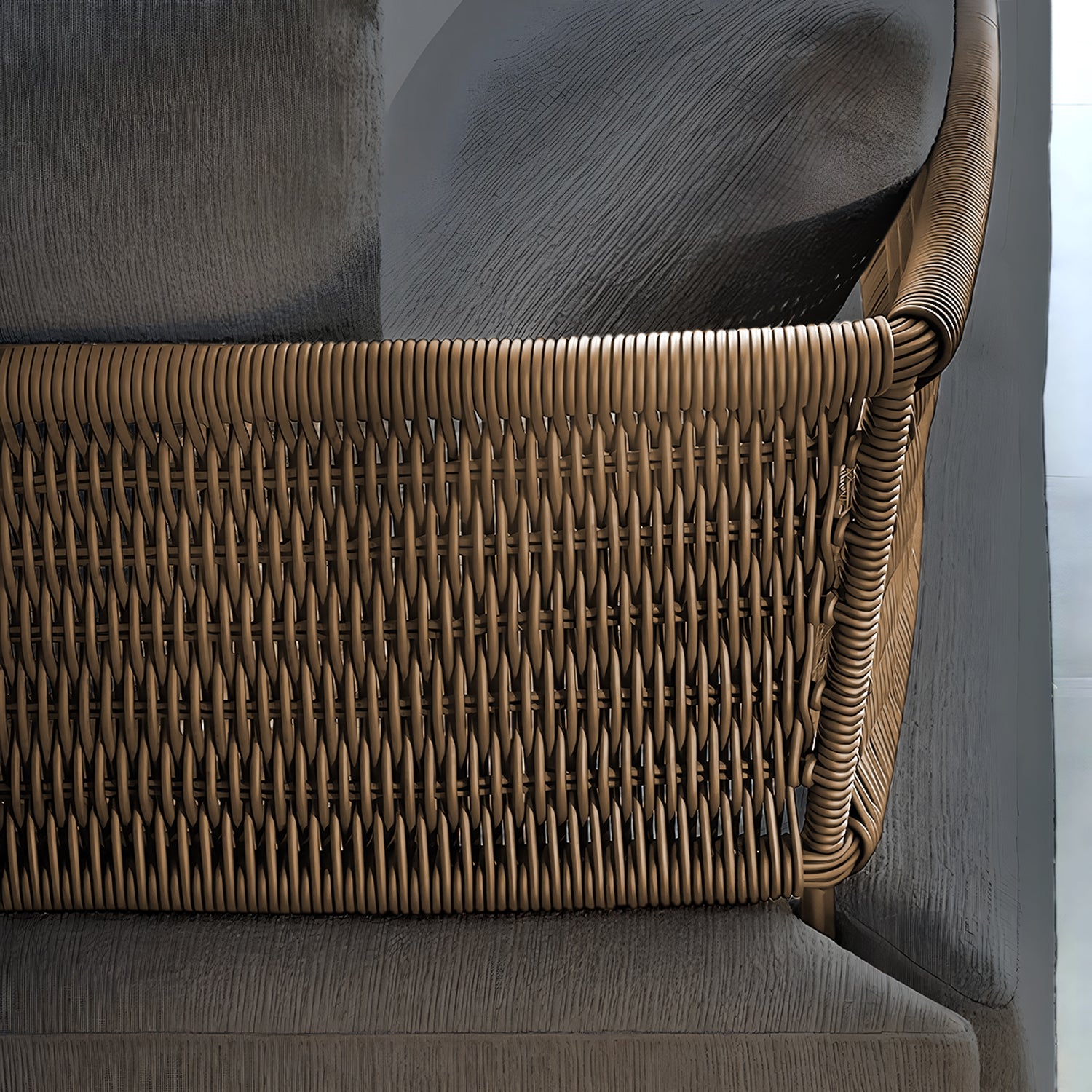 Close-up of a chair from Landmark Decors Oceanview Oasis Collection, featuring a woven rattan backrest with a warm brown hue and a textured gray fabric seat. The design blends natural elements with contemporary style, perfectly complementing outdoor sofas with weather-resistant cushions.