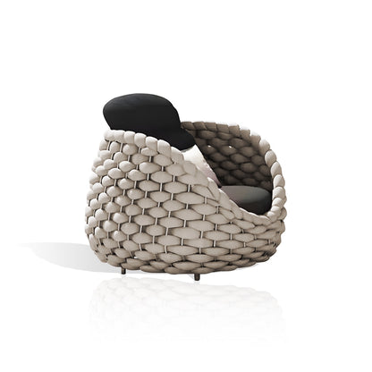 The Nordic Lux Collection by Landmark Decor features a modern rounded, woven armchair with all-weather frames. Its textured light gray basket-like design and contrasting black backrest create an elegant silhouette, perfect for outdoor spaces.