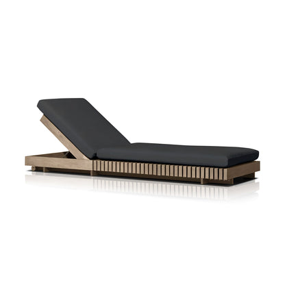 The Golden Coast Lounger Set by Landmark Decor is ideal for outdoor living, featuring a minimalist design with a wooden frame and black cushioned seat. Its adjustable backrest offers multiple reclining options, while the wooden slats detail boosts its modern, sleek look.