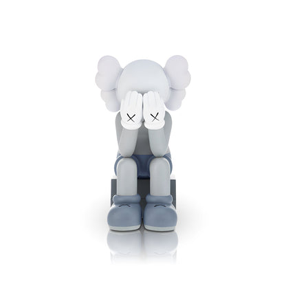 Veiled Thoughts by Landmark Decor features a gray cartoon-like figure with gloved hands and bold black X marks, making it a distinctive artistic sculpture or standout interior decor piece.