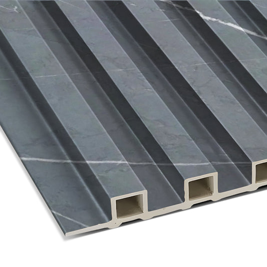 Close-up of Landmark Decor's Black Marble WPC Fluted Slat Wall Panel, designed for accent walls with a marble pattern, vertical grooves, and hollow side channels.