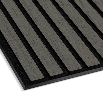 Close-up of the Landmark Decor Grey Oak Acoustic Slat Wall Panel, featuring evenly spaced vertical wooden slats on a dark backing—ideal for soundproofing and giving your interior a modern look.